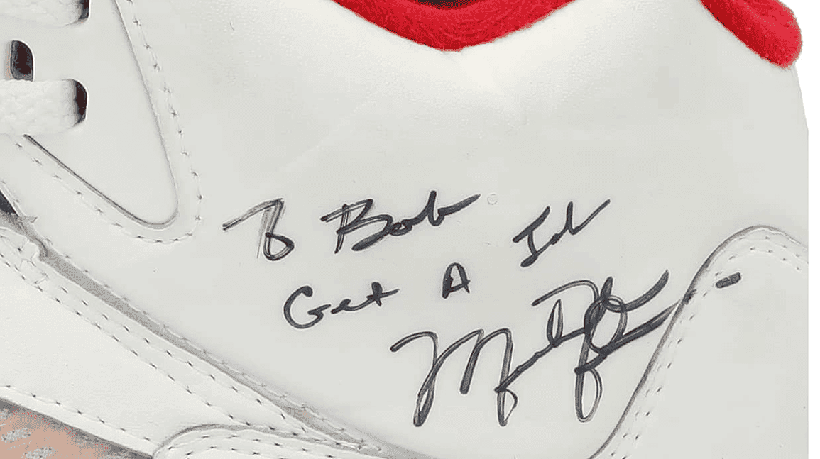 Cover Image for Michael Jordan shoes with inscription 'To Bob, Get a Job' head back to auction